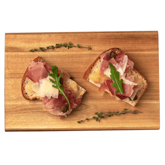 Брускети з прошуто та карамелізованою грушою