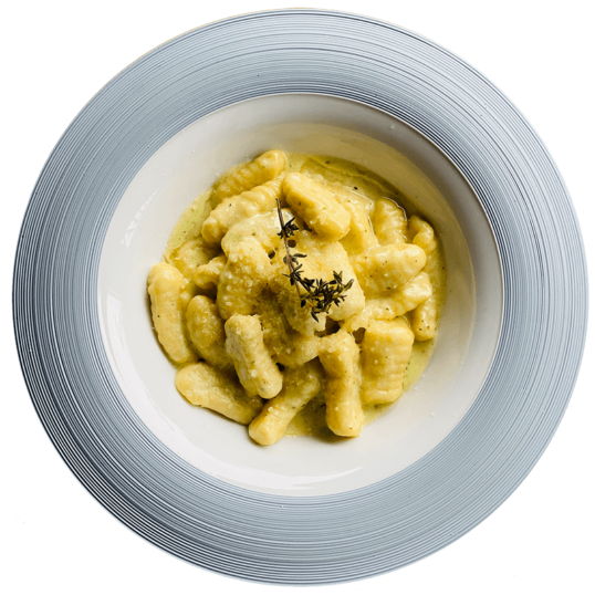 Ньоки з моцарелою та соусом песто