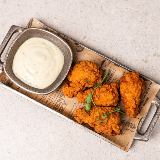 Курячі крила в паніровці